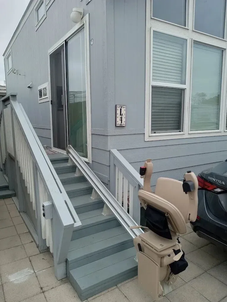Outdoor stairlift installed on porch stairs in San Luis Obispo County, weatherproof installation by Essential Mobility