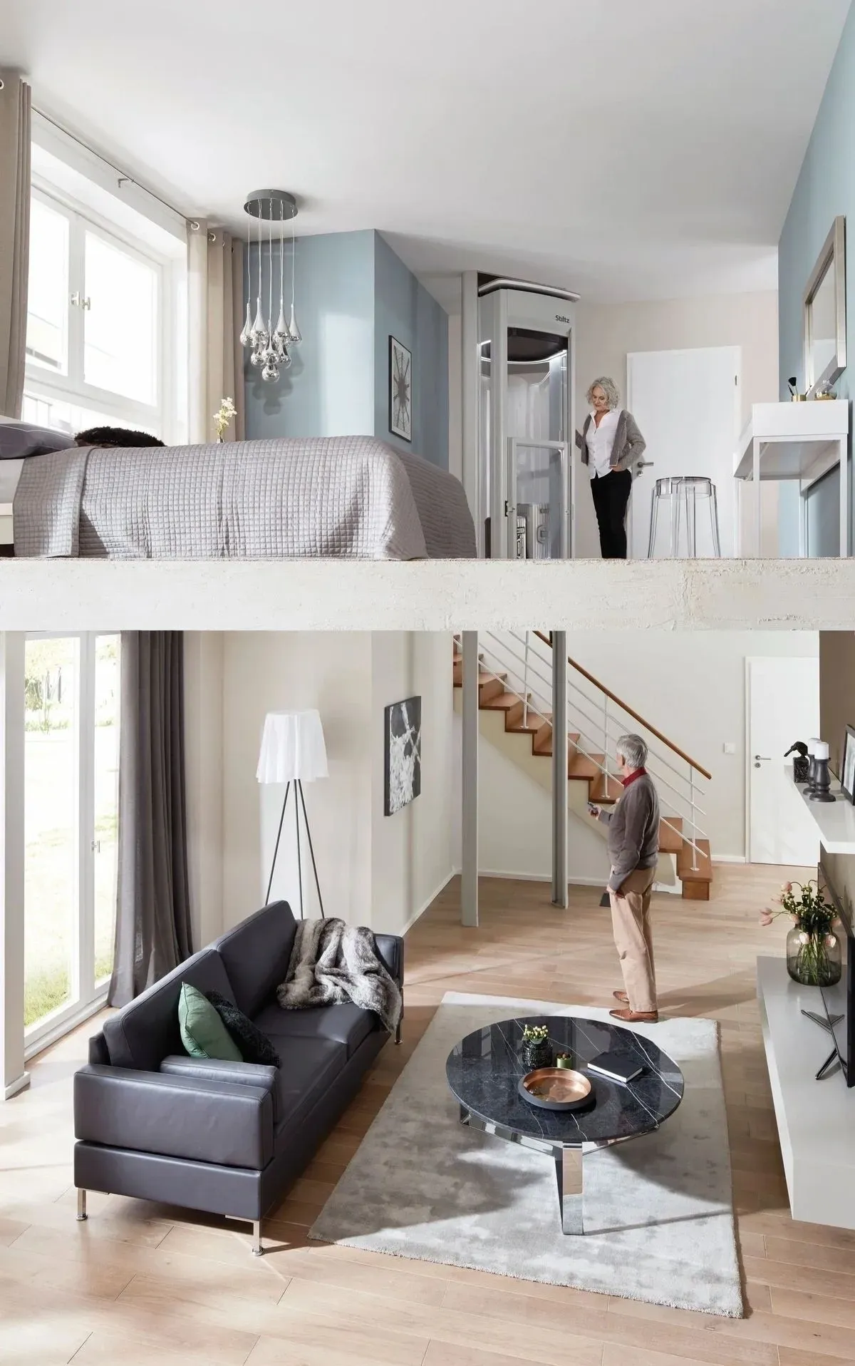 Stiltz home elevator viewed between two floors — bedroom above, living room below