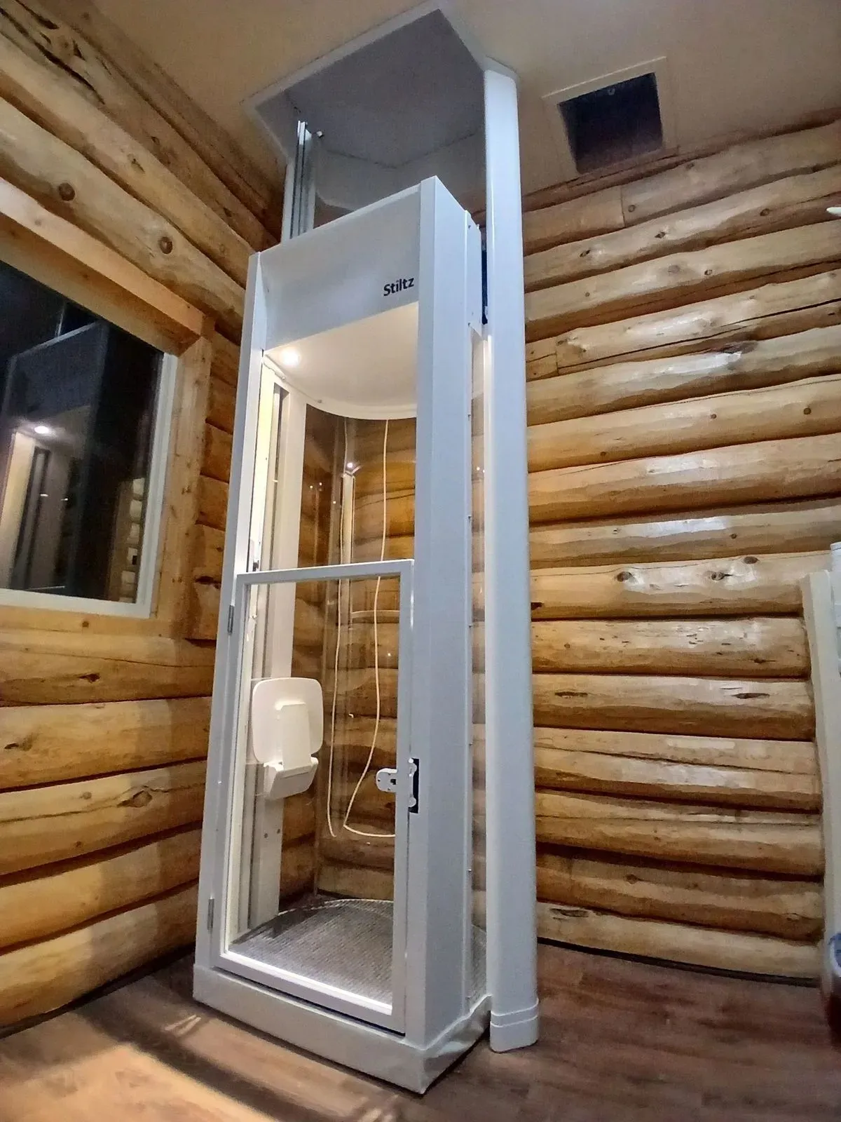 Stiltz freestanding home elevator installed without shaft construction
